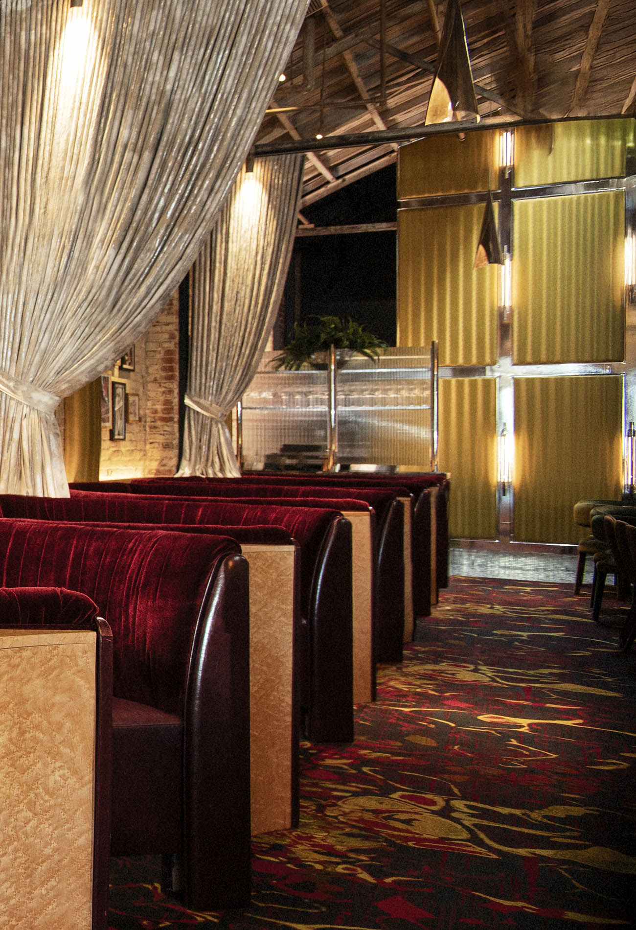 Workind Studio's luxurious dining room design for Le Coq restaurant in La Jolla, California.